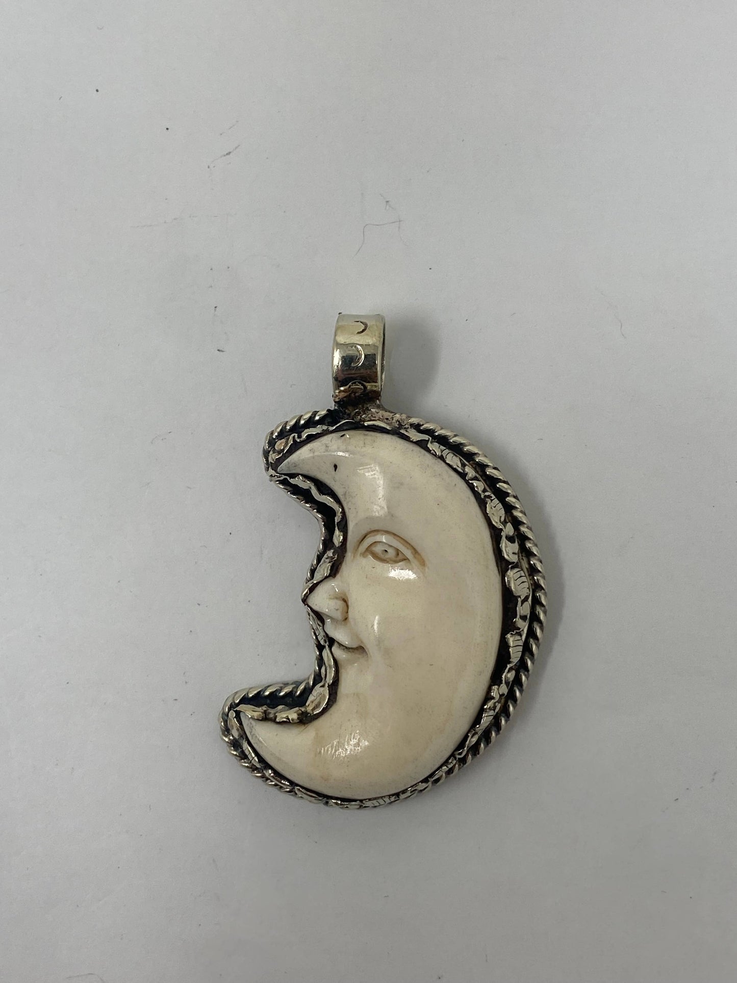 Bone Carved  Moon Face pendant