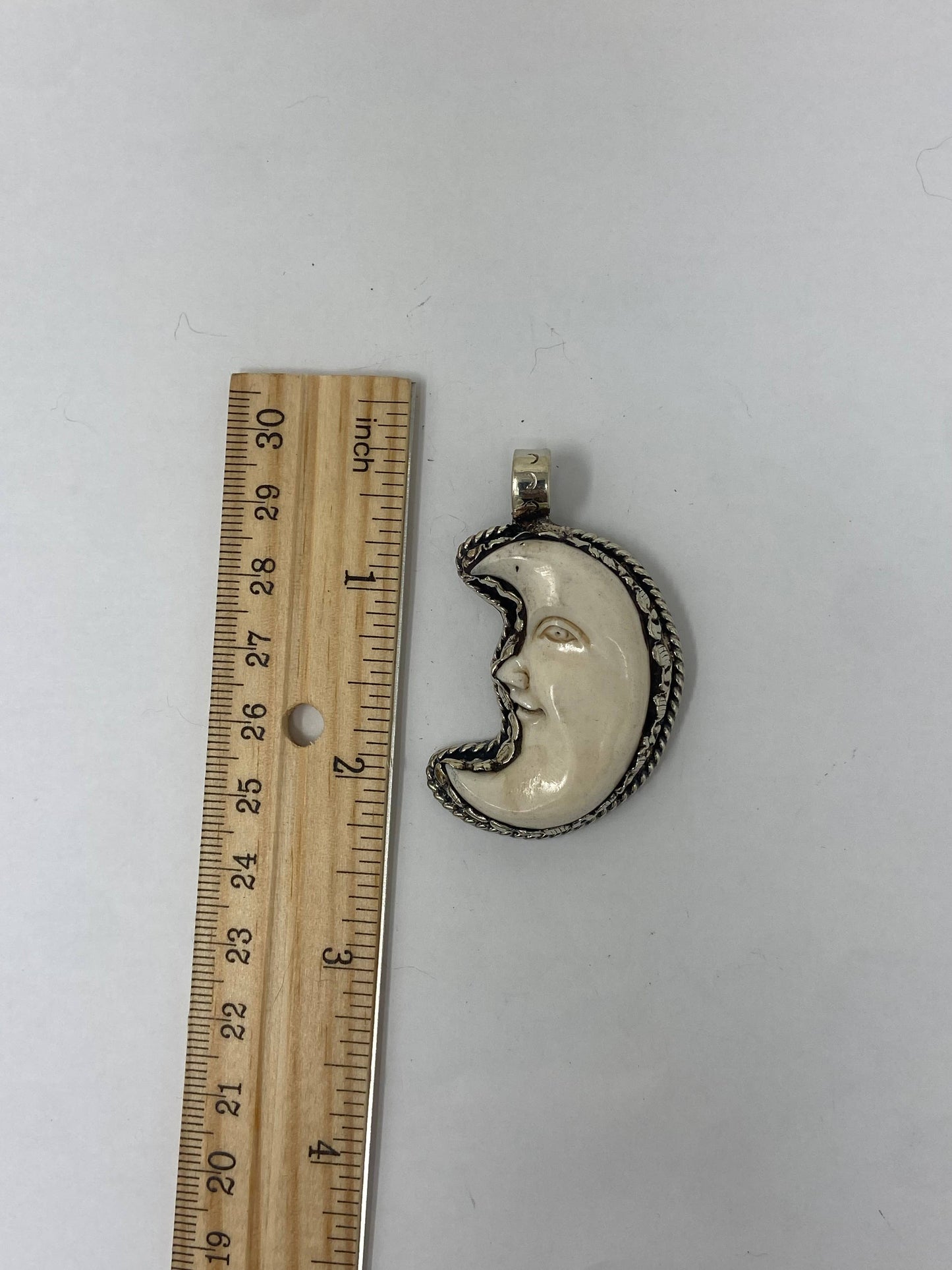 Bone Carved  Moon Face pendant